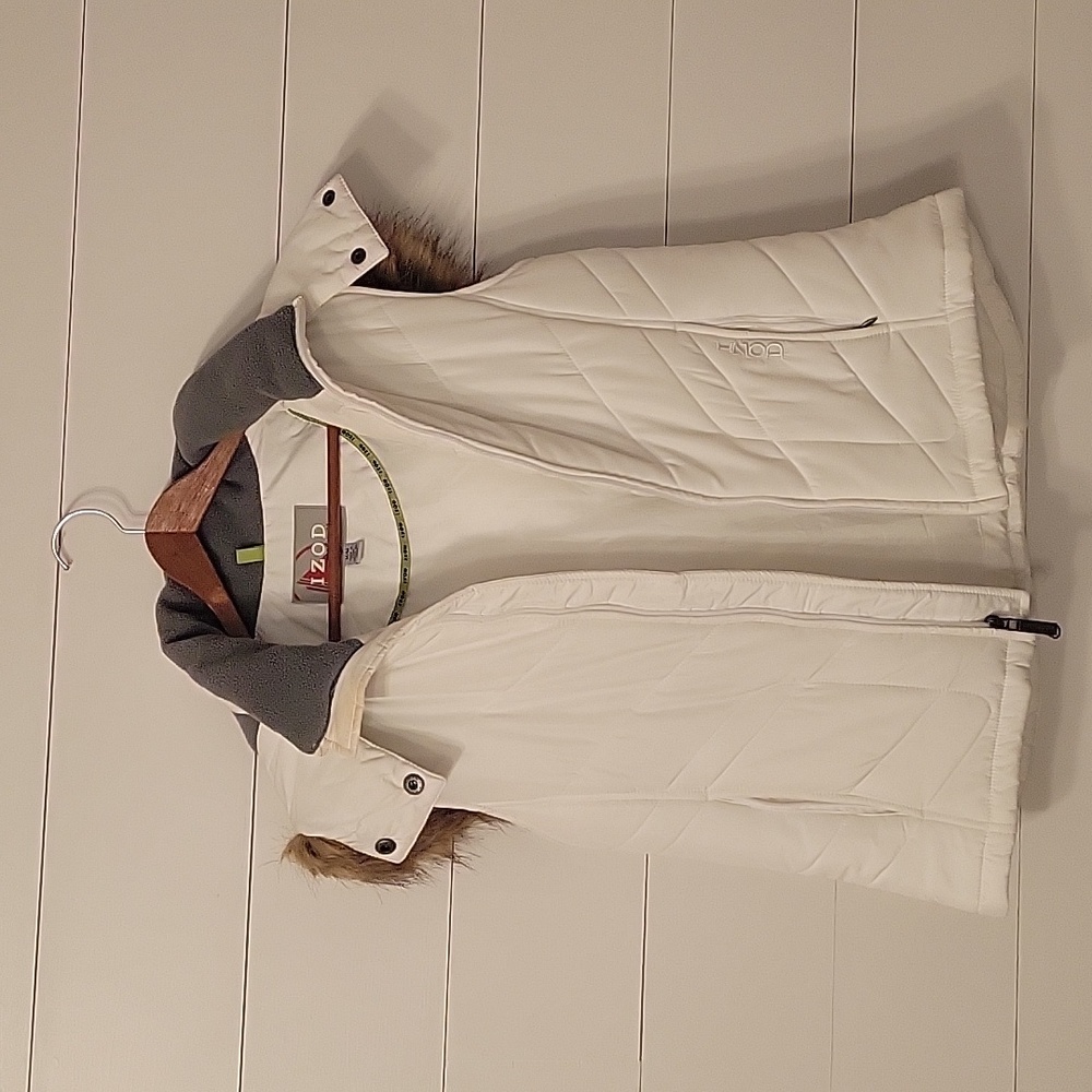 Vest with detachable faux fur trimmed hood.